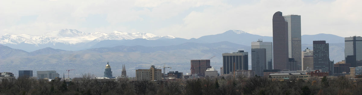 Denver skyline with snow-capped Rocky Mountains