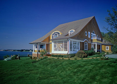 Beautiful Denver home with quality roofline against blue Colorado sky