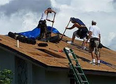 Denver Roof Systems crew working on residential roof replacement